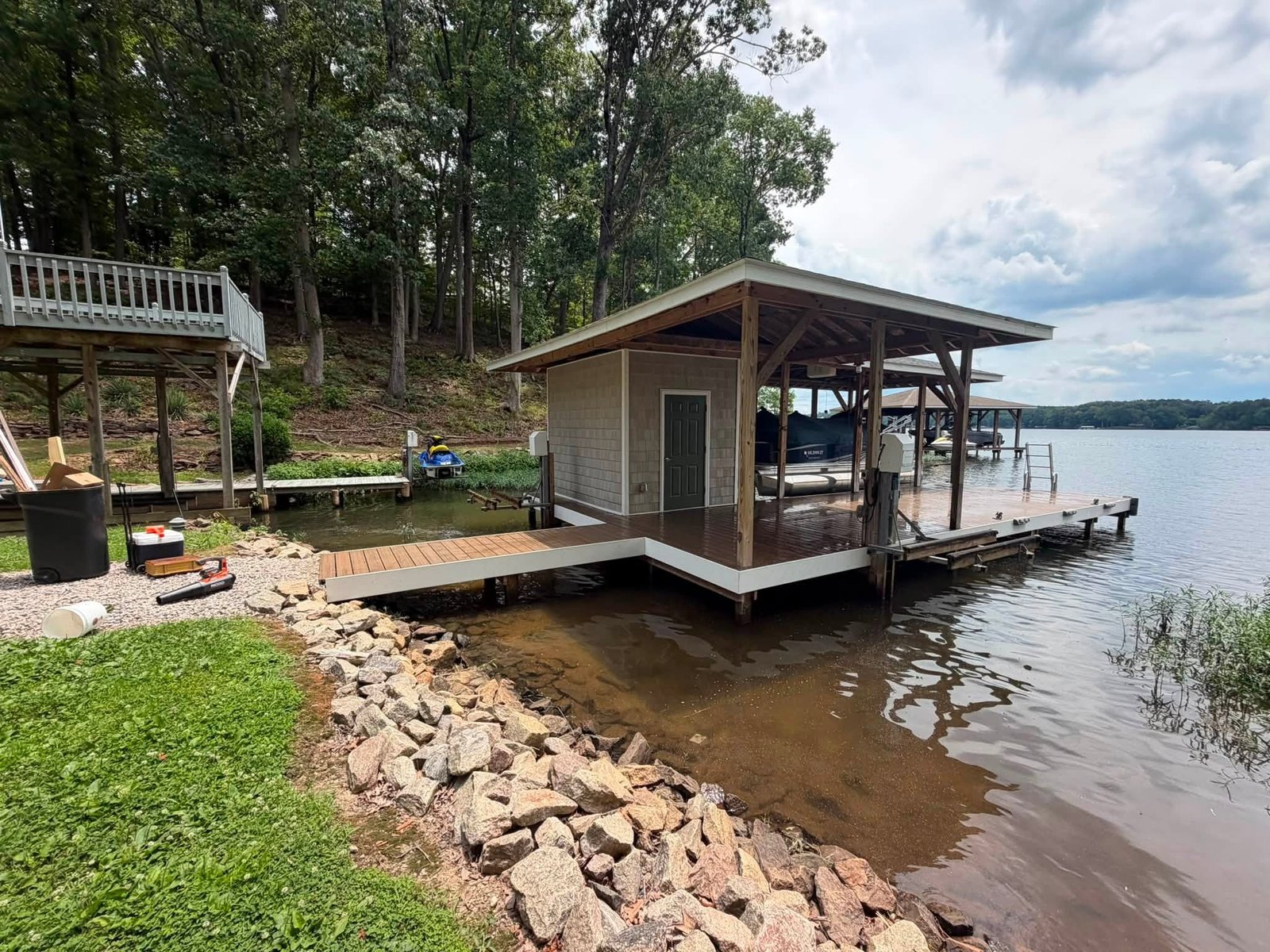 Distant view of a boathouse across Lake Gaston