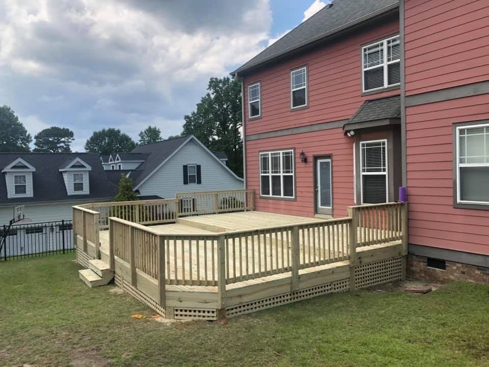 Finished patio deck with white railing