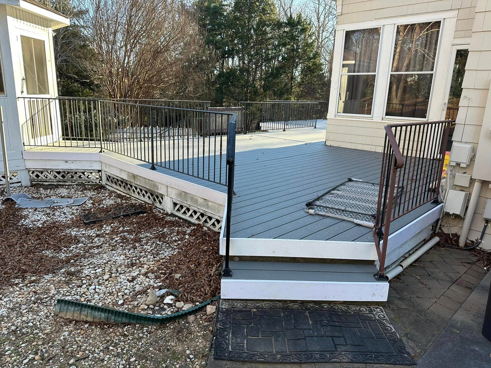 Finished stairs with black railing